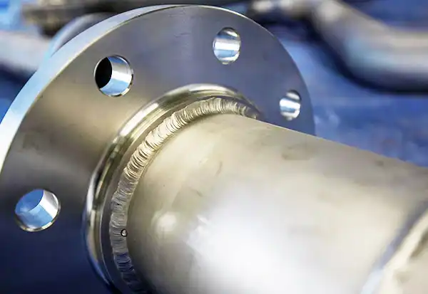 Post-weld heat treatment for welded assemblies in a large industrial oven