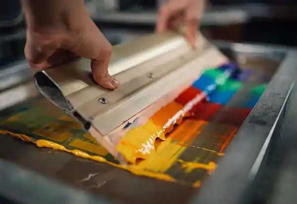 Printing and coating process used in packaging production, where industrial drying ovens control solvent and film formation